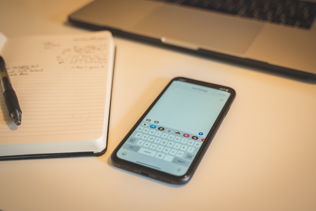 white Samsung Android smartphone on a white table